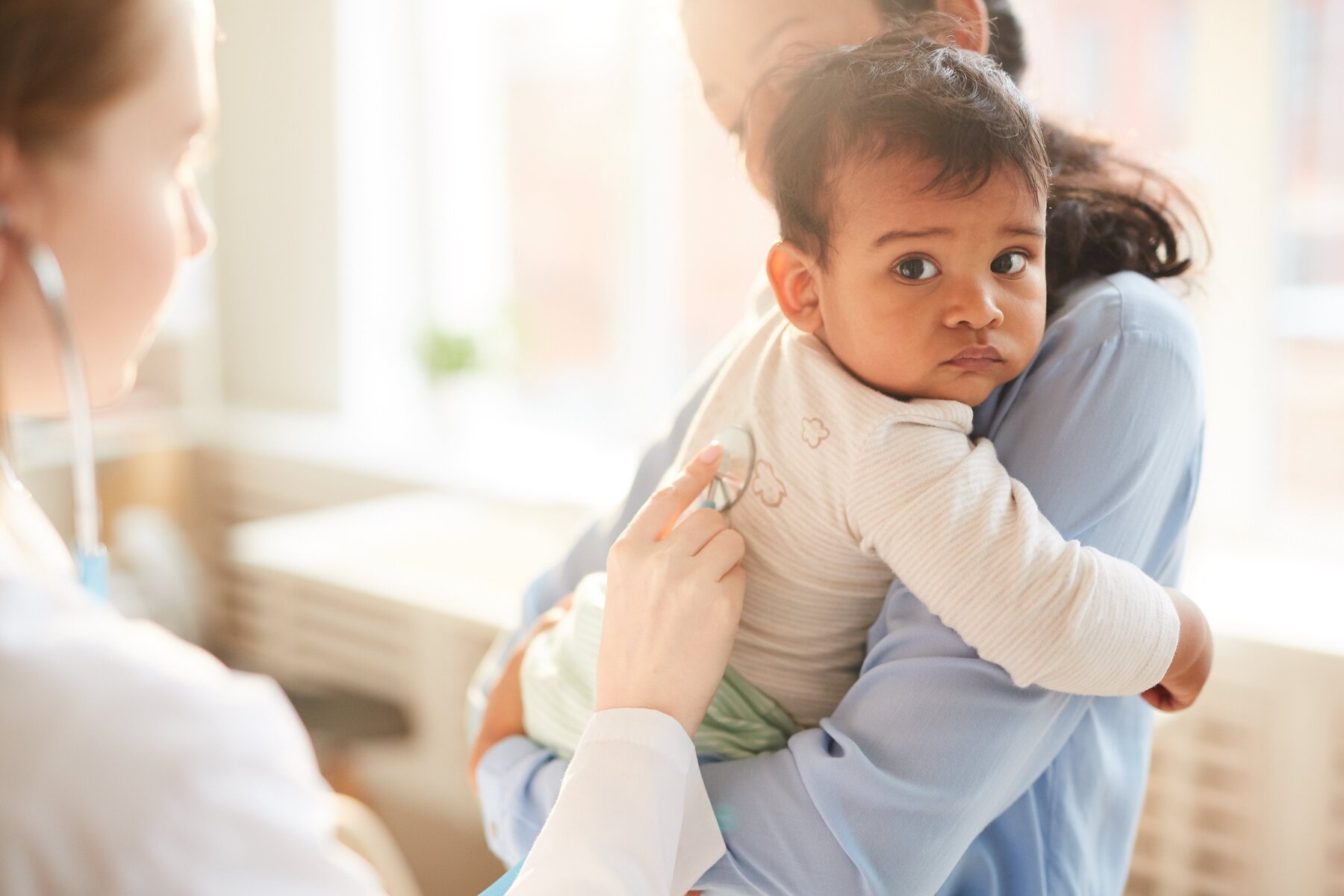 sites/corian.com/IMG/jpg/stock-photo-baby-and-doctor-istock-1160196463-compressed.jpg